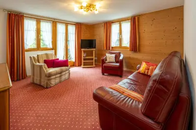 Ein Sitzbereich in der Unterkunft Ferienapartments Chalet Solvay