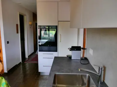 Küche/Küchenzeile in der Unterkunft Silberdistel C9 Central apartment with alps view