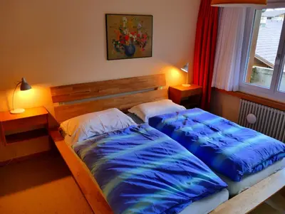 Ein Bett oder Betten in einem Zimmer der Unterkunft Silberdistel C9 Central apartment with alps view