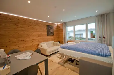 Ein Bett oder Betten in einem Zimmer der Unterkunft Studio Aosta