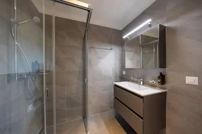 Ein Badezimmer in der Unterkunft Le Chamois l Ski-out l Standing