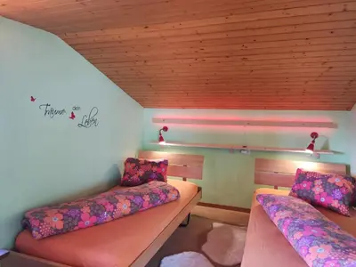 Ein Bett oder Betten in einem Zimmer der Unterkunft Fortuna