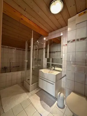 Ein Badezimmer in der Unterkunft Family Penthouse with view of the Swiss Alps