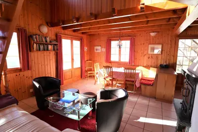 Ein Sitzbereich in der Unterkunft Chalet Papillon
