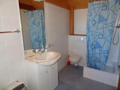 Ein Badezimmer in der Unterkunft Chalet Les Pyramides