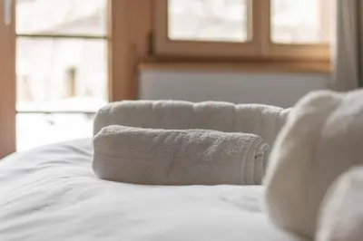 Ein Bett oder Betten in einem Zimmer der Unterkunft Wohnung Homely - Nähe Grindelwald Terminal