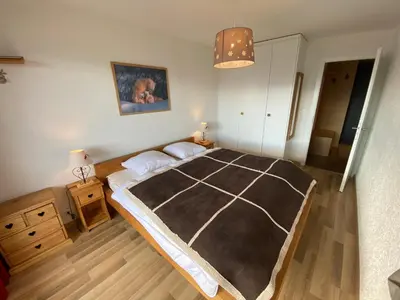 Ein Bett oder Betten in einem Zimmer der Unterkunft Mandarin A8
