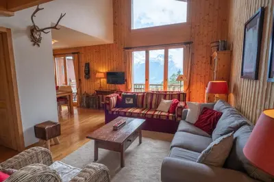 Ein Sitzbereich in der Unterkunft Apartment Mélodie de Rêve