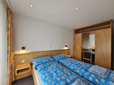 Ein Bett oder Betten in einem Zimmer der Unterkunft Nicoletta