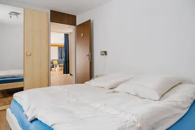Ein Bett oder Betten in einem Zimmer der Unterkunft Casa Yolanda Fiesch-Fieschertal, in der Aletsch Arena