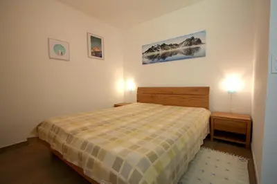 Ein Bett oder Betten in einem Zimmer der Unterkunft Apartment Weisshorn
