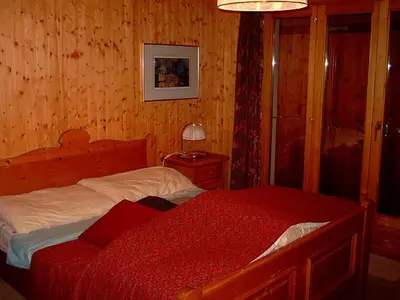 Ein Bett oder Betten in einem Zimmer der Unterkunft Chalet Solina