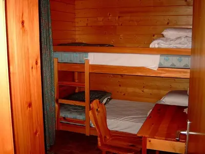 Ein Bett oder Betten in einem Zimmer der Unterkunft Chalet Solina