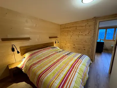 Ein Bett oder Betten in einem Zimmer der Unterkunft Ferienwohnung Am Hang 1OG
