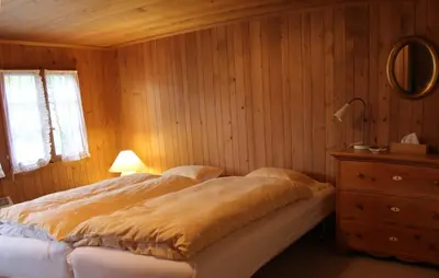 Ein Bett oder Betten in einem Zimmer der Unterkunft Chalet Hubel