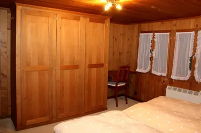 Ein Bett oder Betten in einem Zimmer der Unterkunft Chalet Hubel