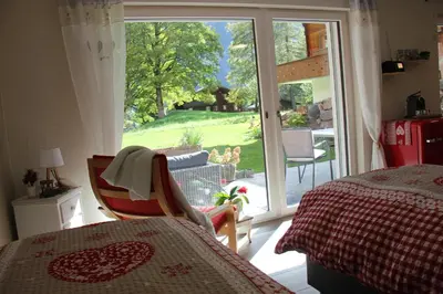 Ein Bett oder Betten in einem Zimmer der Unterkunft Bergwohl