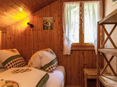Ein Bett oder Betten in einem Zimmer der Unterkunft Chalet Dominic by Interhome