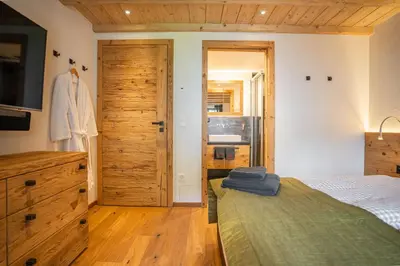 Ein Bett oder Betten in einem Zimmer der Unterkunft Akelei Penthouse by HomeFlow