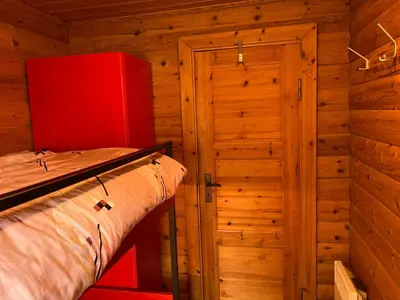 Ein Bett oder Betten in einem Zimmer der Unterkunft Chalet Glimuschir