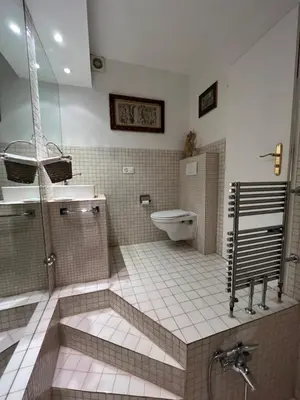 Ein Badezimmer in der Unterkunft Bel appartement deux chambres à coucher Etrier