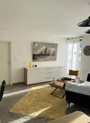Ein Sitzbereich in der Unterkunft Appartement 70m2, entrée autonome, lit 180x200, terrasse privée, parking gratuit