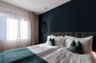 Ein Bett oder Betten in einem Zimmer der Unterkunft Andermatt Arve Relax by Quokka 360