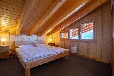 Ein Bett oder Betten in einem Zimmer der Unterkunft Tschoueilles 014 MOUNTAIN & VIEW - chalet 12 pers