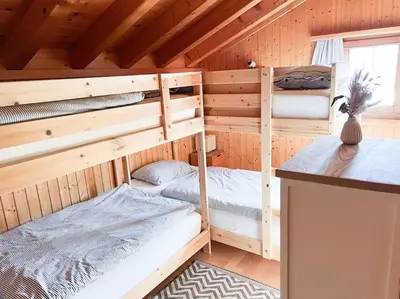Ein Bett oder Betten in einem Zimmer der Unterkunft Chalet Domino