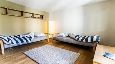 Ein Bett oder Betten in einem Zimmer der Unterkunft Haus Luchre Zermatt Wohnung mit Matterhornblick