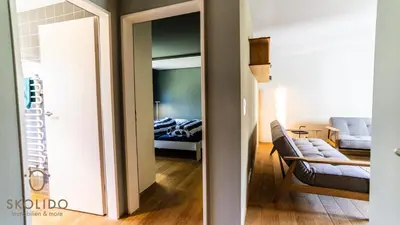 Ein Bett oder Betten in einem Zimmer der Unterkunft Haus Luchre Zermatt Wohnung mit Matterhornblick