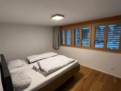 Ein Bett oder Betten in einem Zimmer der Unterkunft Larix