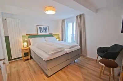 Ein Bett oder Betten in einem Zimmer der Unterkunft Chalet Aeschhorn