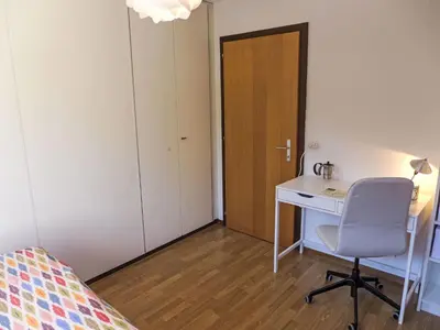 Ein Bett oder Betten in einem Zimmer der Unterkunft Apartment La Verdure Est N-22 by Interhome