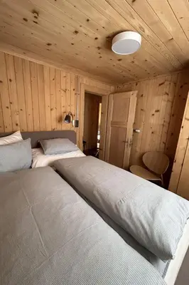 Ein Bett oder Betten in einem Zimmer der Unterkunft Apartment Haus Alpengruss EG by Interhome