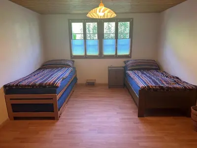Ein Bett oder Betten in einem Zimmer der Unterkunft Apartment Ferienwohnung Gehrihorn by Interhome