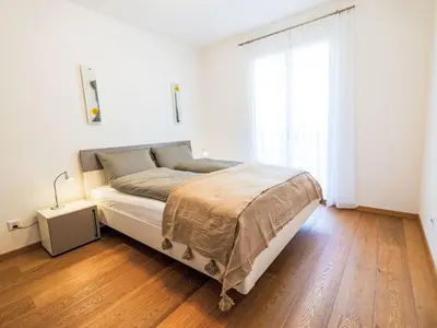 Ein Bett oder Betten in einem Zimmer der Unterkunft Apartment B21 by Interhome