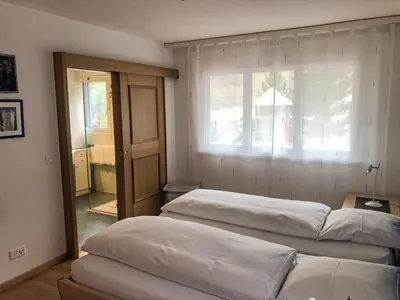 Ein Bett oder Betten in einem Zimmer der Unterkunft Apartment Edelweiss B-3 by Interhome