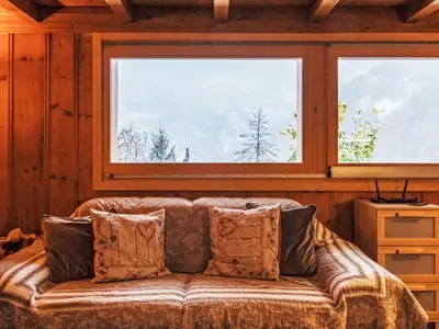 Ein Bett oder Betten in einem Zimmer der Unterkunft Chalet Chalet Grepon by Interhome