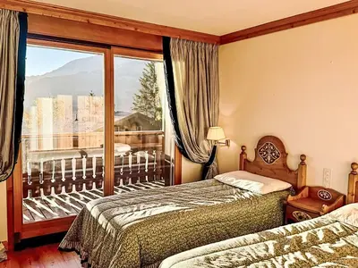 Ein Bett oder Betten in einem Zimmer der Unterkunft Apartment Les Renardeaux 5 by Interhome