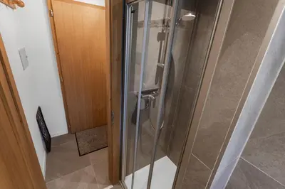 Ein Badezimmer in der Unterkunft Chaleureux studio avec vue époustouflante