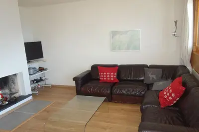 Ein Sitzbereich in der Unterkunft Gentianes COSY & MOUNTAIN apartments