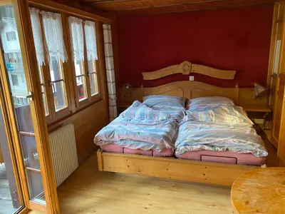 Ein Bett oder Betten in einem Zimmer der Unterkunft Le Manoir d'Anniviers