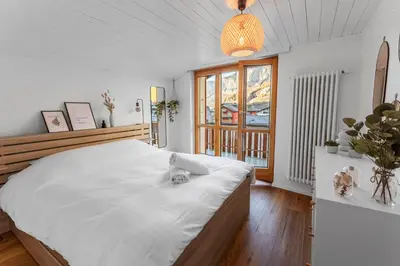 Ein Bett oder Betten in einem Zimmer der Unterkunft Magnifique appartement central à Loèche-les-Bains