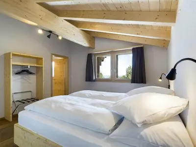 Ein Bett oder Betten in einem Zimmer der Unterkunft Hidden Retreats Alpine Edge