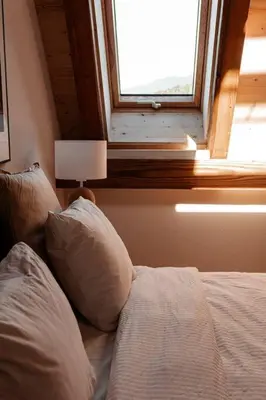 Ein Bett oder Betten in einem Zimmer der Unterkunft Hidden Retreats The Blausee