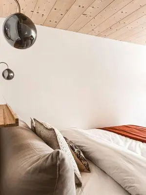 Ein Bett oder Betten in einem Zimmer der Unterkunft Hidden Retreats The Seehof 2
