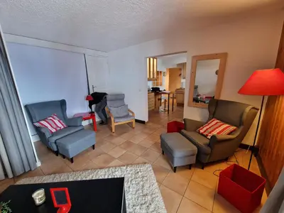 Ein Sitzbereich in der Unterkunft Magnifique appartement en bord des pistes