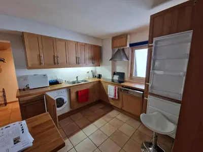 Küche/Küchenzeile in der Unterkunft Magnifique appartement en bord des pistes