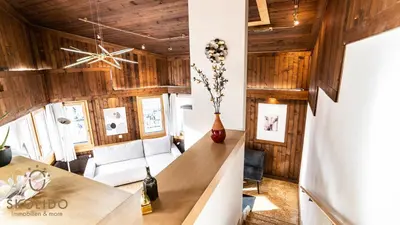 Ein Sitzbereich in der Unterkunft Ferienwohnungen Haus Butterfly, Saas-Fee
